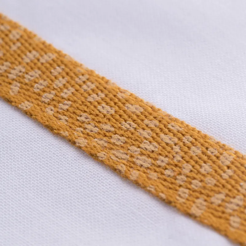 Wieglaken 75x100cm AOP Tape Ochre/white bies